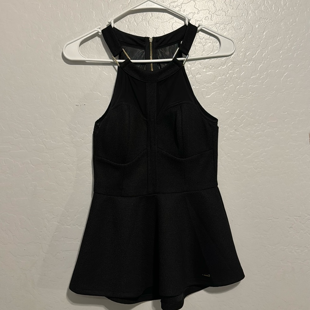 Black bebe peplum top strap detail